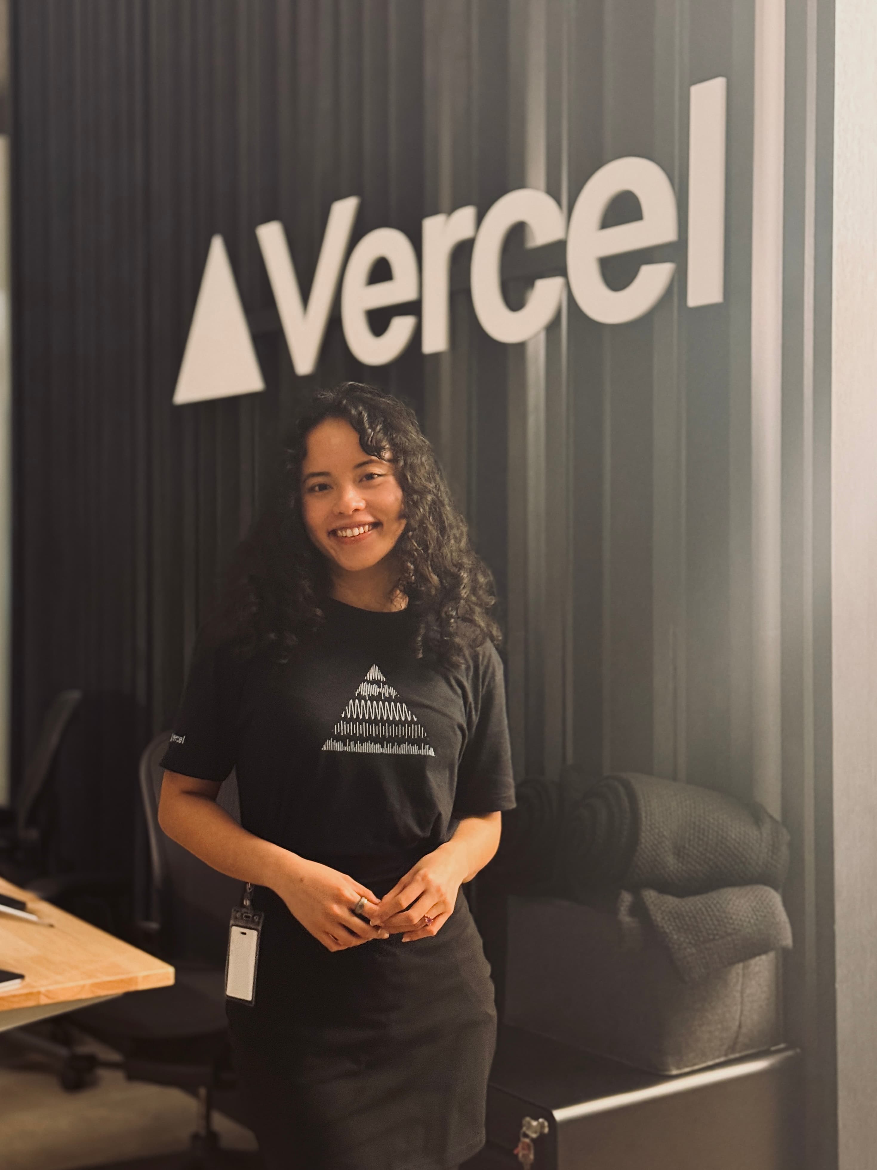 Vercel Community branding representing Pauline's current role as Head of Community Platforms, building and leading the Vercel Community since June 2024, continuing her journey in developer relations and community leadership