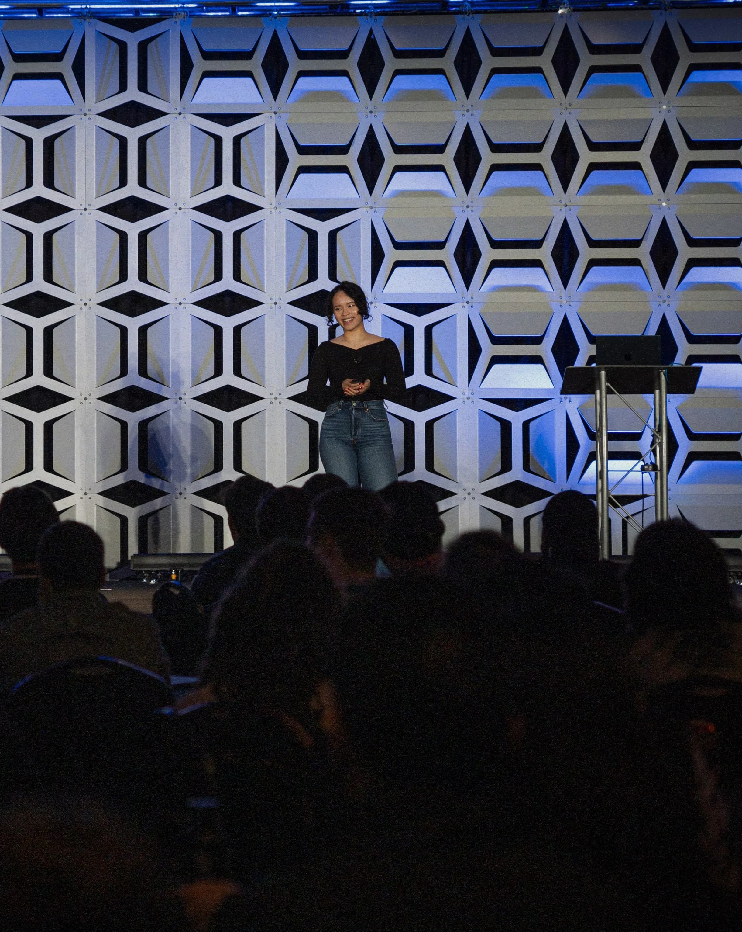 Pauline Narvas engaging with developers at a community event in California, demonstrating her expertise in building and leading developer communities